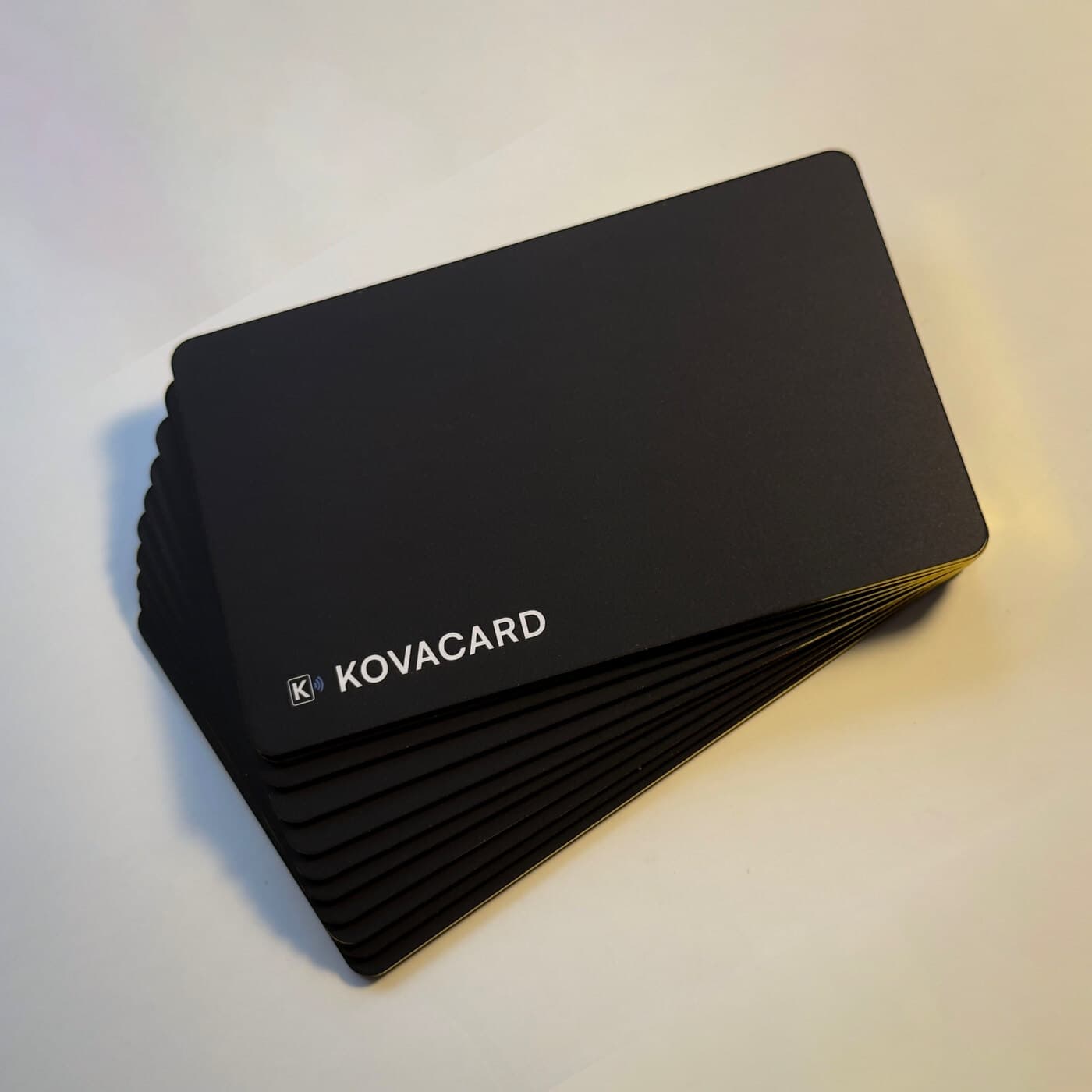 A fanned stack of matte black cards