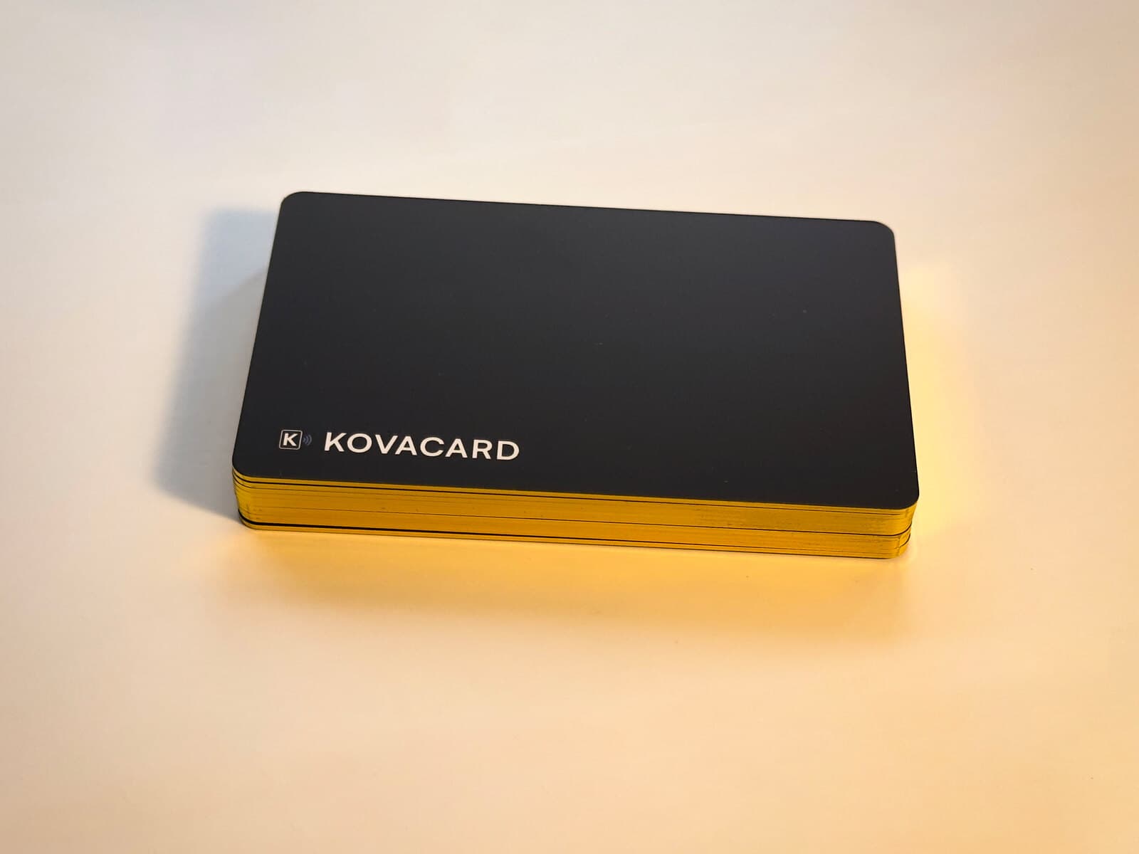 A stack of cards, the gold edge catching the light